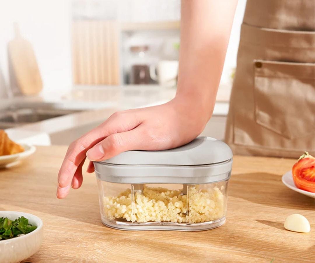 Fast cutting Hand push garlic cutter